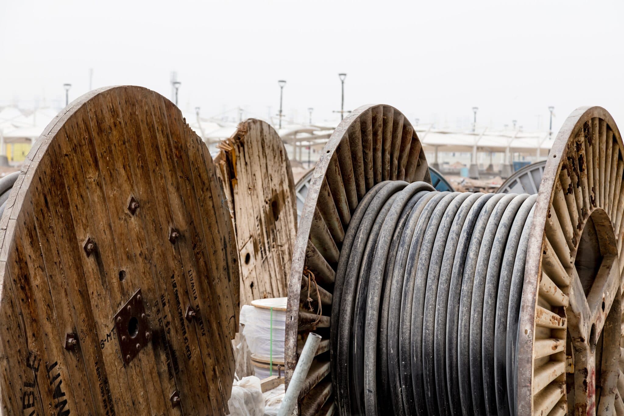 Fiber optic cable spools staged for the Samruddhi Mahamarg corridor deployment